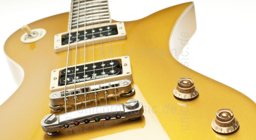 zur Artikelbeschreibung / Preis E-Gitarre FERNANDES RAVELLE DELUXE - Gold Top + Koffer